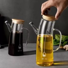 Новая стеклянная бутылка для приправы для масла большой емкости.